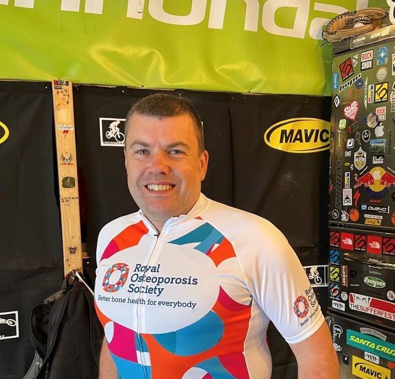 Picture of a man wearing a cycling top