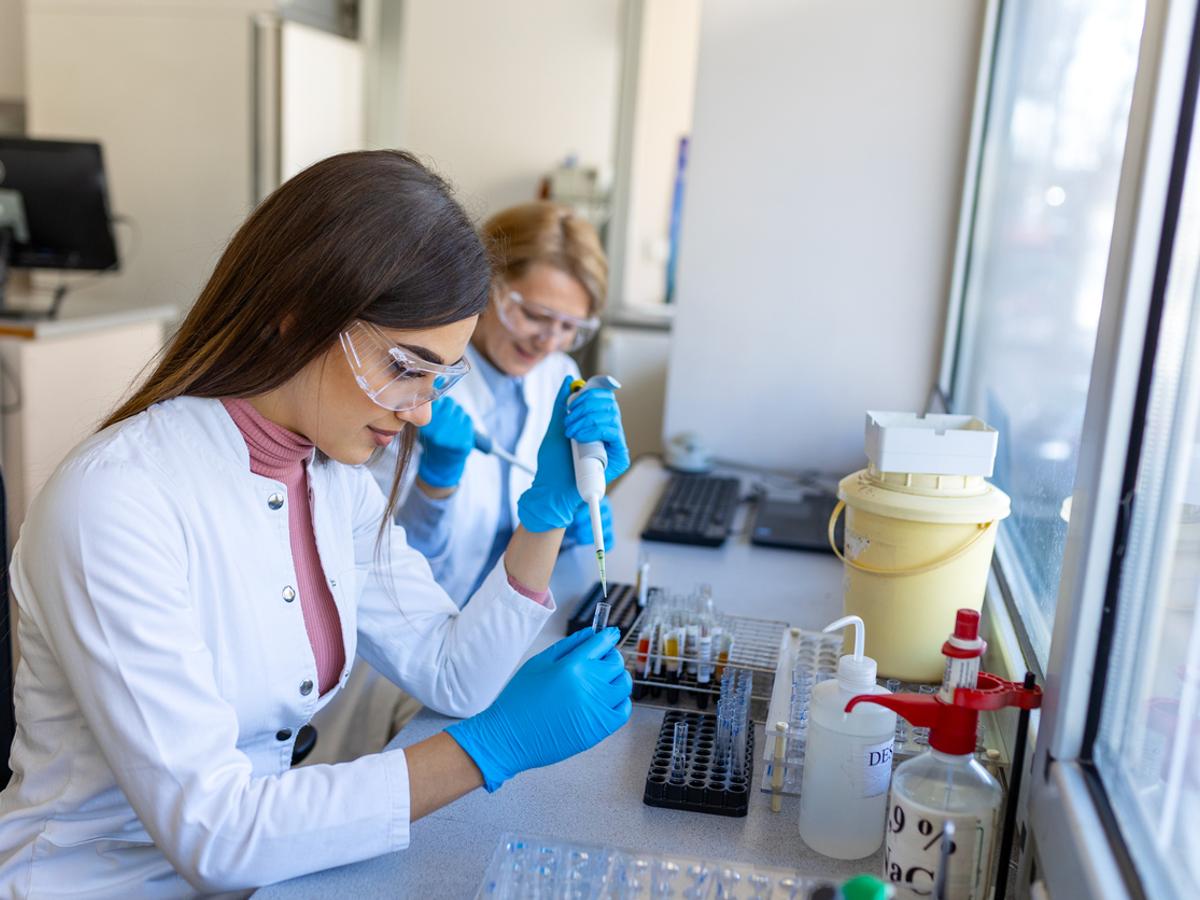 Young researcher running tests in a lab