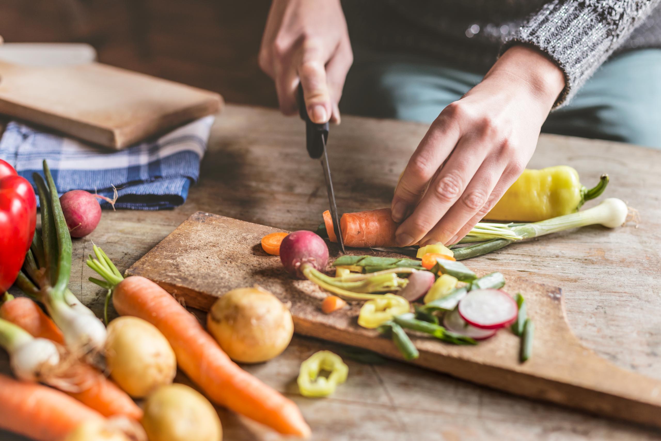 Person chopping vegetables