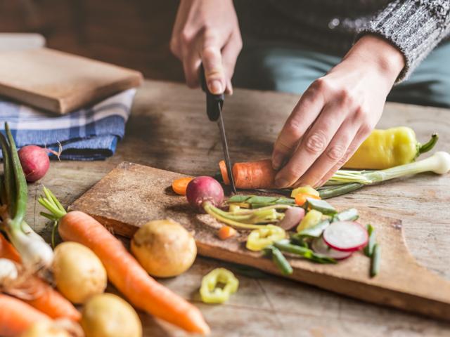 Person chopping vegetables